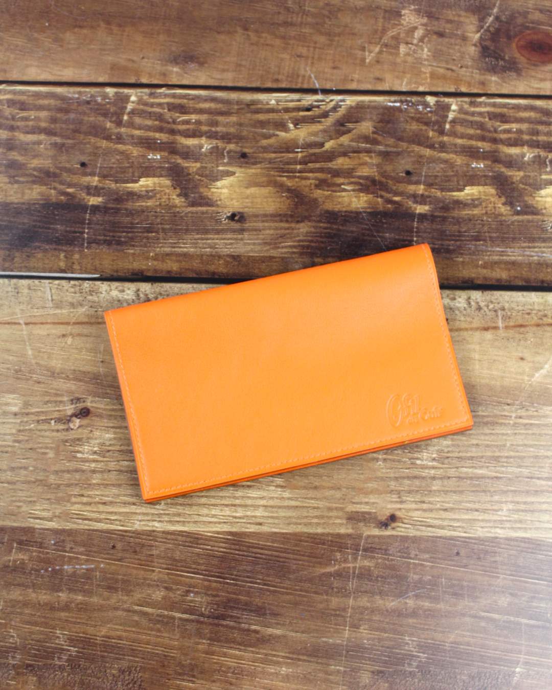Porte-chéquier-horizontal-en-cuir-orange Porte chéquier horizontal en cuir orange