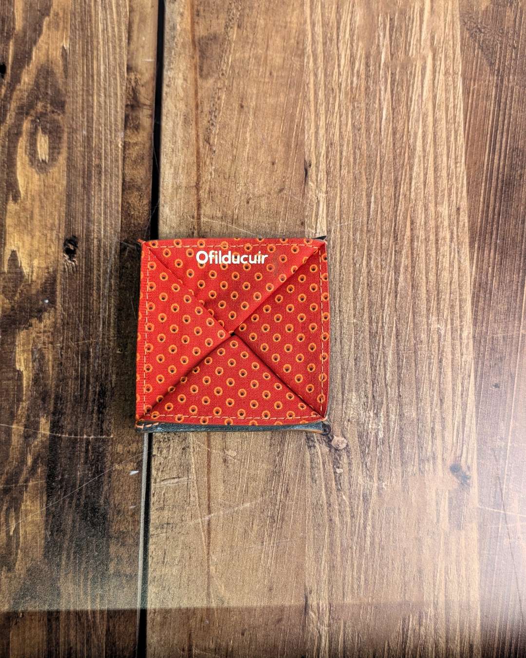 Porte-monnaie-origami-en-cuir-doublé-tissu Porte monnaie origami en cuir et doublé tissu coton petits pois orange