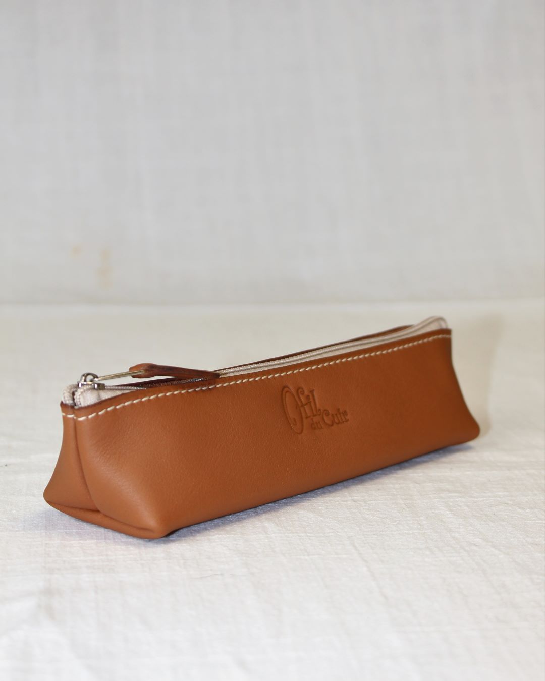 Trousse-stylos-sac-main-cuir-ofilducuir-lyon-france Trousse de sac à main pour femme en cuir pour crayons ou maquillage fabriquée en cuir à Mornant